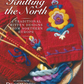 Cover of "Knitting the North: 4 Traditional Mitten Patterns from Northern Europe – eBook printed copy," showcasing a red mitten with vibrant floral embroidery, accompanied by knitting needles and yarn. The text reads, "Traditional Mitten Designs from Northern Europe," under the "Long Thread Media" brand.