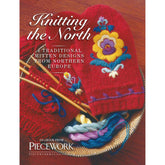 A cover of the eBook titled "Knitting the North: 4 Traditional Mitten Patterns from Northern Europe" from Long Thread Media. The image features colorful knitted mittens with floral patterns, wool yarn in various colors, and knitting needles in a basket.