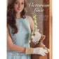 A woman in a light blue sleeveless dress gently holds a flowering plant while wearing intricate lace gloves. The text on the image reads, "Victorian Lace: 7 Timeless Projects to Knit – eBook printed copy." The image is the cover of an eBook from PieceWork Magazine by Long Thread Media.