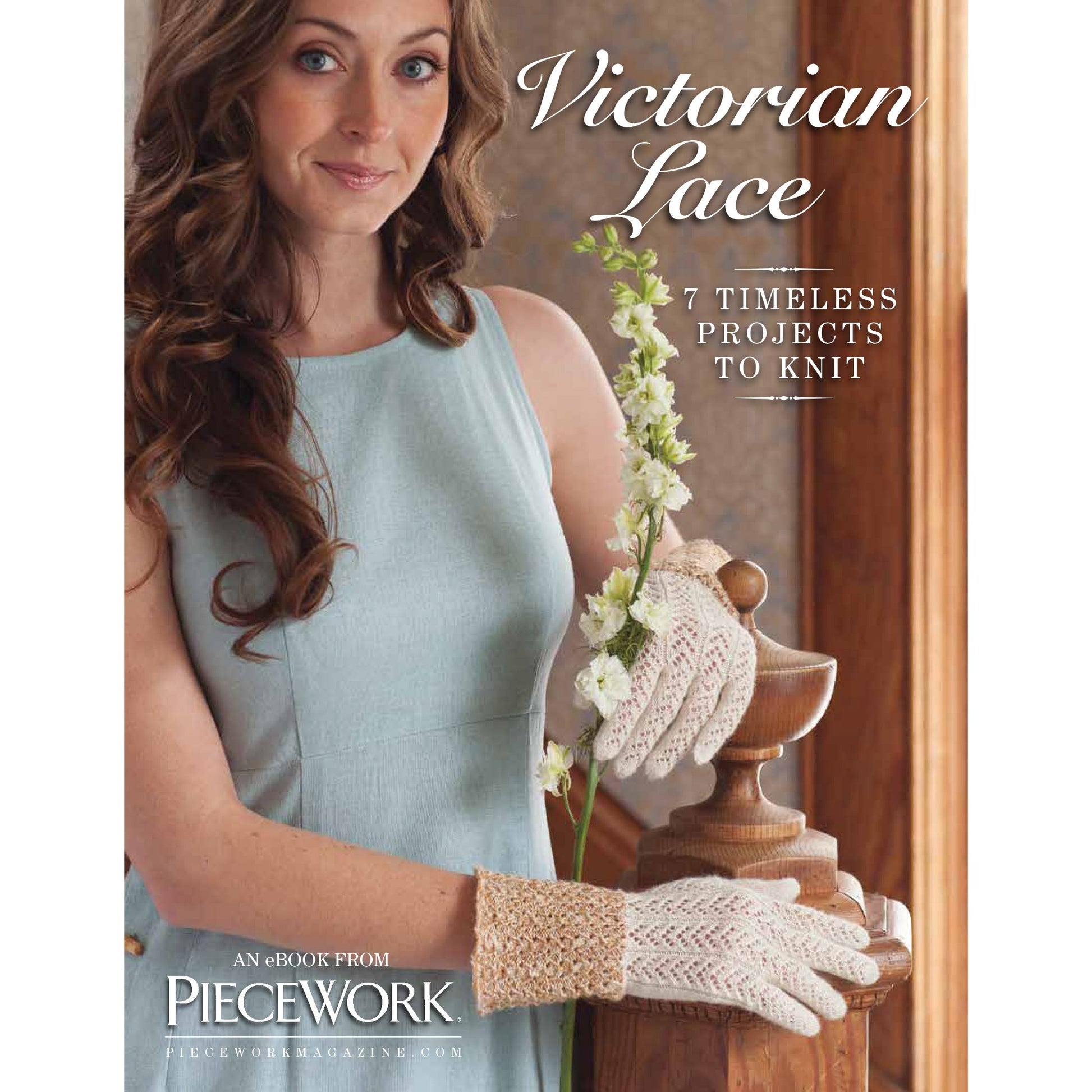 A woman in a light blue sleeveless dress gently holds a flowering plant while wearing intricate lace gloves. The text on the image reads, "Victorian Lace: 7 Timeless Projects to Knit – eBook printed copy." The image is the cover of an eBook from PieceWork Magazine by Long Thread Media.