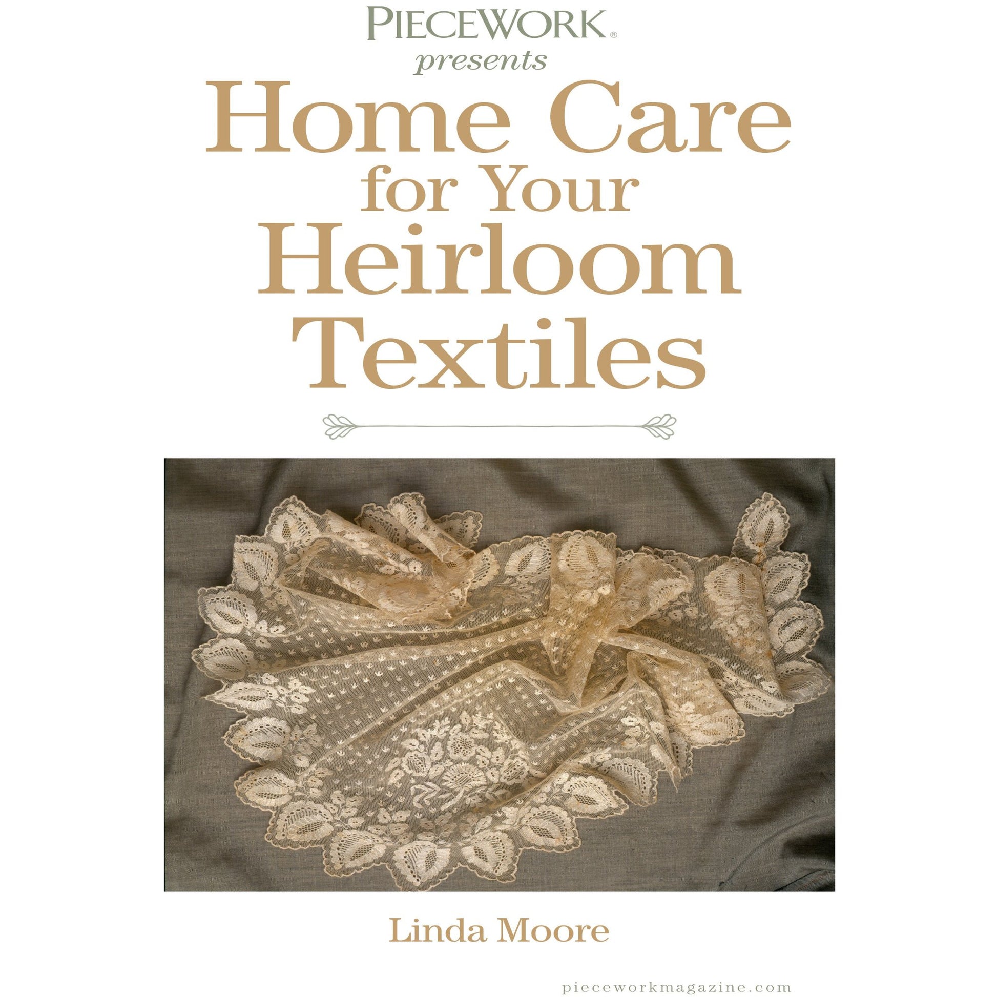 Cover page titled "Home Care for Heirloom Textiles – eBook printed copy" by Linda Moore, presented by Long Thread Media. The cover features an intricate lace textile with floral patterns placed on a grey surface, emphasizing the preservation and care of delicate vintage textiles.