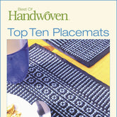 Cover of the "Best of Handwoven, Top Ten Placemats on Four Shafts eBook," a printed version by Long Thread Media, showcasing blue and black placemats with geometric patterns on a wooden table. A blue cup and a bowl with snacks are partially visible in the background.