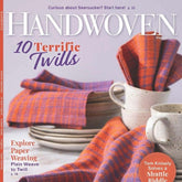 Cover of Handwoven Magazine May/June 2022 by Long Thread Media. The cover image showcases purple and orange handwoven textiles set against a white background, accompanied by a cup and saucer. The headline reads "10 Terrific Twills," with other featured articles on topics such as Paper Weaving, Turkish Towels, and solving a shuttle riddle.