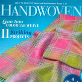 A magazine cover for "Handwoven Magazine May/June 2023" by Long Thread Media features a colorful plaid fabric with text highlights. The cover promotes articles on "Lean Into Color-and-Weave," "11 Striking Projects," and more. The fabric showcases vibrant pink, green, yellow, and blue colors, offering perfect inspiration for Deflected Doubleweave Rugs.