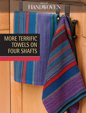 Two vibrant woven towels hang on hooks against a wooden backdrop. One towel showcases stripes in blue, green, and purple hues, while the other exhibits red, black, and blue stripes. Text reads "Best of Handwoven, More Terrific Towels on Four Shafts" by Long Thread Media.