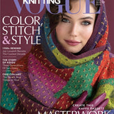 Cover of Vogue Knitting magazine, Late Winter 2019 edition from Soho Publishing. A woman in a multicolored knitted shawl wraps it around her shoulders and head. Headlines read: "Color Stitch & Style," "1980s Rewind," "The Story of Koigu," and "Chic Collars." Featuring whimsical watercolor themes among others.
