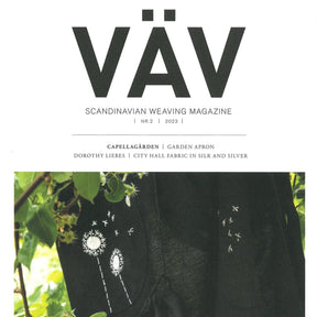 Cover of VÄV Magasinet 2/23 from VÄV Magazine. The title is "Scandinavian Weaving Magazine." Featured articles include: Capellagården, Garden Apron, Dorothy Liebes, and City Hall Fabric in Silk and Silver. A close-up of a black handwoven fabric with embroidered dandelions.