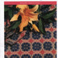 Cover of Weaver's Craft Issue 7: Weaving Overshot from Plain Tabby Press, featuring a woven textile in blue, red, and beige geometric patterns crafted on a four-shaft loom, complemented by green leaves and a yellow lily flower. Text at top includes the magazine title and edition details.