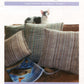 A magazine cover titled "Weaver's Craft Issue 4: Warping from the Front of the Loom" from Plain Tabby Press for August/September 2000, Volume 1, Number 4. The cover features a cat sitting atop a couch with woven pillows. Below the couch are a book and a pair of glasses. Headline topics include weaving techniques, looms, and potpourri warp pillows.