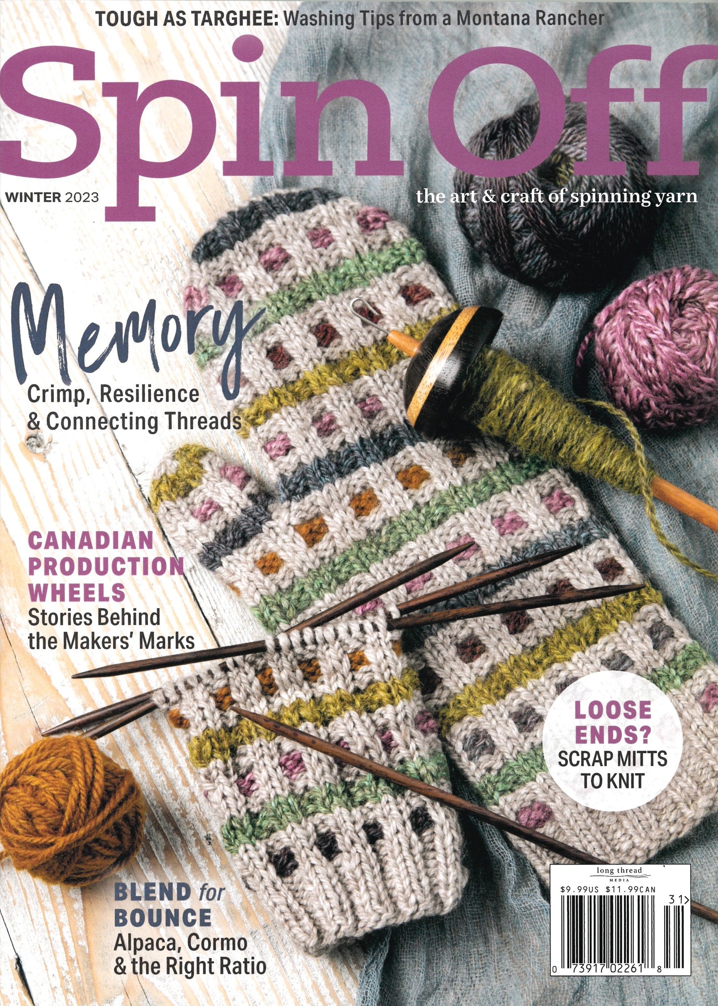 The cover of Spin Off Winter 2023 by Long Thread Media showcases vibrant yarn balls, a checkered knit piece made from Targhee wool, and knitting needles. The headlines highlight topics such as yarn spinning, Canadian production wheels, and inventive projects using scrap mitts.