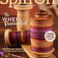 Cover of Spin Off Fall 2022 from Long Thread Media. Features two wooden bobbins adorned with multi-colored yarn and highlights themes such as "Indigenous Design" and "Antique Wheel Rehab." Discover how tradition meets innovation in this edition.