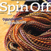 Cover of Spin Off Summer 2024 by Long Thread Media. The headline reads: "Handspun for Handknits." The image features a close-up of colorful skeins of handspun yarn, including enchanting ombre blends, showcasing various hues and textures, with a wooden surface in the background.