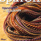 The cover of Long Thread Media's Spin Off Summer 2024 magazine showcases a stunning backdrop of vibrant, handspun yarn skeins. The prominent text reads "Handspun for Handknits" and highlights articles on blending ombré, refining wet-finishing techniques, and weaving with self-striping yarn.