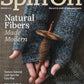 A person expertly crafts handspun yarn using a drop spindle while wearing fingerless gloves. The text highlights "Spin Off Winter 2025," by Long Thread Media, featuring "Natural Fibers Made Modern" and intriguing article previews about silk cakes, textured yarn tutorials, and knitting mitts.