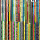 A neatly arranged stack of Issue 45, Summer 2024 of "PLY - The Magazine for Handspinners" from PLY Magazine showcases its vibrant spine colors and issue name. The white "Reference" text at the bottom complements the insightful yarn measurement guides and reference sheets featured within.