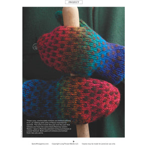 Two hands wearing vibrant, hand-knitted mittens in a multicolored pattern with shades of blue, purple, red, and green. The mittens are clasped around two spindles of wool yarn. Text at the bottom describes the construction and yarn used for the project from "Delightful Mittens to Spin Year-Round: 8 Knitted Patterns from Spin Off" by Long Thread Media.