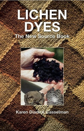 Cover image of "Lichen Dyes: The New Source Book" by Karen Diadick Casselman, published by Dover Books. The cover showcases a textured, woven background with a central photograph displaying hands holding lichen and dyed fibers, highlighting ecologically sound dyeing techniques. The book title is prominently displayed at the top in white text.