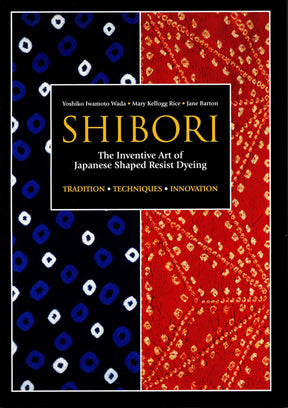 Book cover of "Shibori - The Inventive Art of Japanese Shaped Resist Dyeing" by Yoshiko Iwamoto Wada, Mary Kellogg Rice, and Jane Barton, published by Penguin Random House. The cover features a blue section adorned with white dots alongside a red section displaying intricate patterns that highlight shibori techniques. Text includes "Tradition Techniques Innovation.