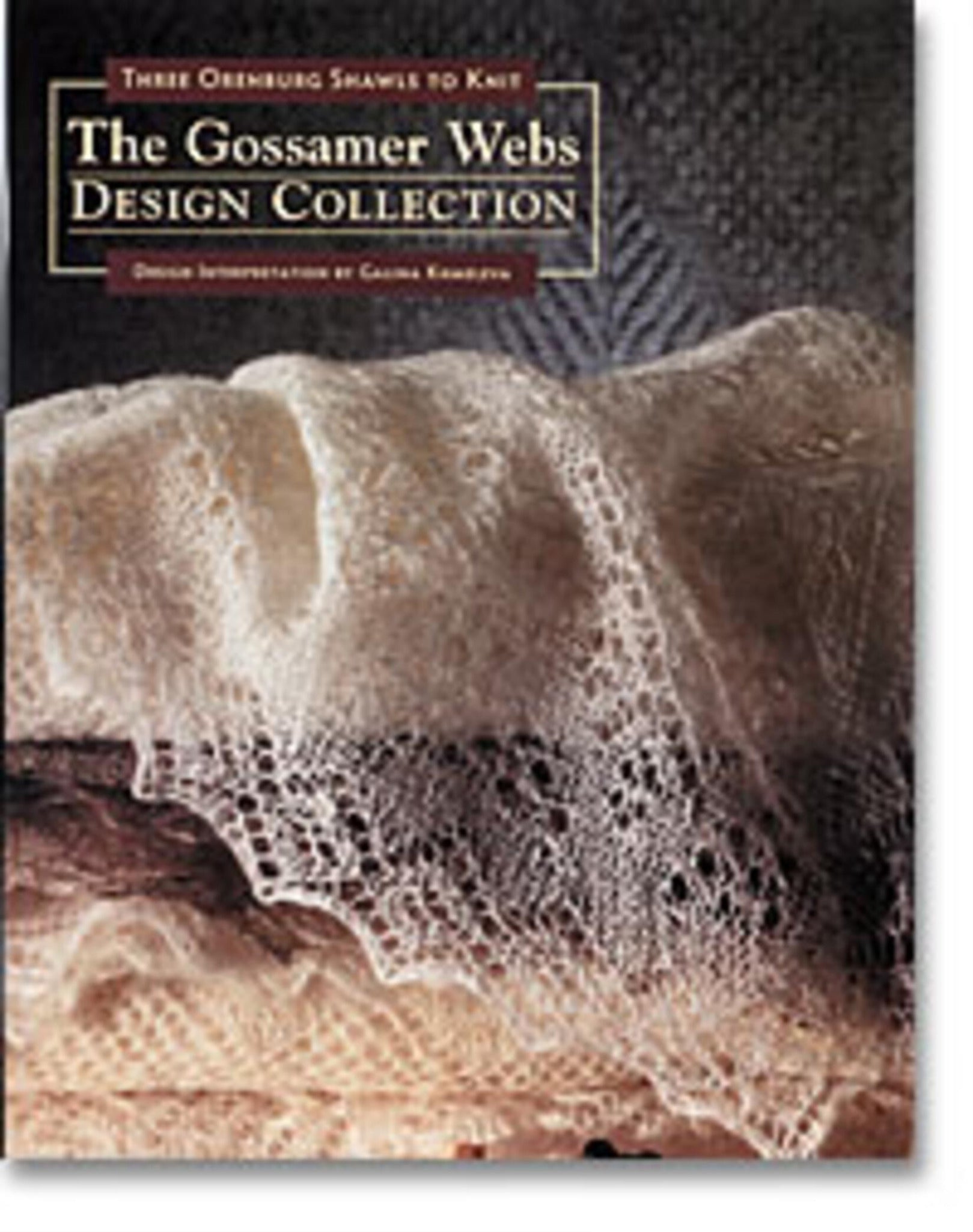 A book cover titled "Gossamer Webs Design Collection: Three Orenburg Shawls to Knit," featuring design interpretation by Galina Khmeleva under the Ingram Content brand. The background showcases a delicate lace shawl, reminiscent of a Diamond Triangular Shawl, draped over a dark surface, highlighting the intricate knit patterns.