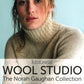 Cover of "Wool Studio Vol. 4: The Norah Gaughan Collection" by Ingram Content. It features a woman wearing a cream-colored, high-neck knitted sweater, posing against a pale blue background. "Wool Studio Vol. 4" is prominently displayed in bold letters, highlighting the exquisite knitting patterns within.