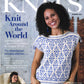 A woman with curly hair smiles, wearing a blue and white knitted top featuring intricate patterns, as she graces the cover of "Interweave Knits Summer 2021" by Golden Peak Media. The magazine explores "Knit Around the World," showcasing knitting projects and designs inspired by global influences.