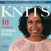 The cover of the Golden Peak Media's "Interweave Knits Summer 2023" magazine showcases a smiling woman with curly hair donning a pink knitted top. The title reads "Interweave Knits Summer 2023," and the cover highlights include "10 Endless Summer Knits: Garments For Warmer Weather" and a feature about testing summer yarns with the headline, "Results Are In! Summer Yarns Tested.