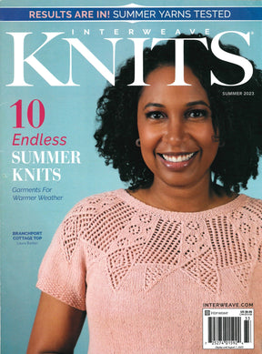 Cover of Interweave Knits Summer 2023 by Golden Peak Media features a smiling woman wearing a pink knitted top with lace details. Text highlights 10 "Endless Summer Knits" perfect for warmer weather, including the "Branchport Cottage Top" by Laura Barker. Barcode and pricing details at the bottom.