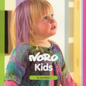 A toddler with blonde hair is wearing a colorful hand-knitted cardigan. The text on the image reads "Noro Kids by Knitting Fever / Euro Yarns." The background consists of vertical stripes in different pastel colors, highlighting the unique little one’s charming outfit made with Noro yarns.