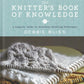 Cover of "The Knitter's Book of Knowledge" by Ingram Content. The cover showcases a knitted fabric sample placed over another knit item, set against a soft-focus backdrop that emphasizes essential knitting techniques.