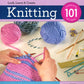 A book cover by Ingram Content titled "Knitting 101 - A Workshop in a Book." The cover showcases vibrant balls of yarn in pink, blue, and multicolored shades, along with knitting needles, scissors, a ruler, stitch markers, and an illustration of someone hand-knitting a striped piece in pink and blue — perfect for anyone eager to learn the art of knitting.