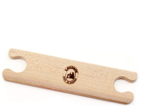 Introducing the Leclerc Stick Shuttle by Leclerc Looms: a wooden thread holder with two notches on either end and an engraved logo in the center. The logo features a castle and the text "Leclerc Looms, Made in France" around it. Crafted like sturdy shuttles, it proudly displays its elegance against a white background.