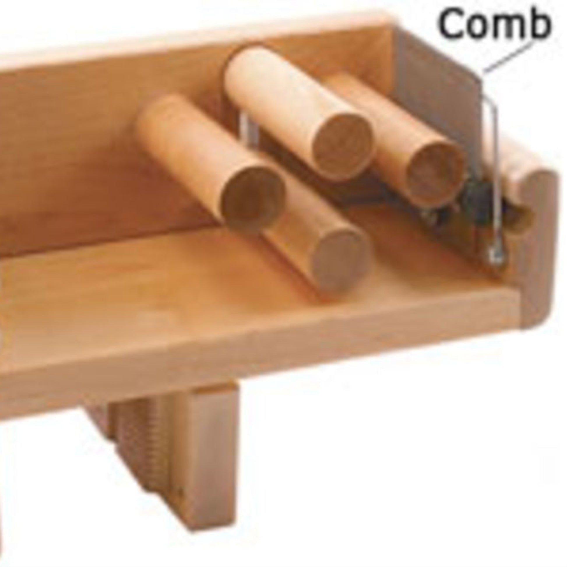 The Leclerc Tension Box Comb by Leclerc Looms is a wooden weaving accessory with multiple cylindrical rods and a 4 dent comb attachment. The comb, located on the right side of the device, is designed for guiding or organizing threads or materials. The structure is mounted on a small wooden base, characteristic of a Leclerc Tension Box.