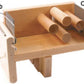 The Leclerc Tension Box Comb by Leclerc Looms is a wooden frame designed for beehive maintenance, featuring two sections labeled "Comb" and multiple cylindrical rods for structure and support. A green ring is attached to the left side of the frame, making it an essential accessory similar to a 4 dent comb for managing and maintaining beehive combs.