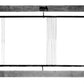 A photograph of the Leclerc Complete Shaft/Harness Frame for Looms from Leclerc Looms. This rectangular frame, available in metal or wood, features wire strings running vertically through its center and comes with hooks at the top, presumably for hanging. Its specific use is not immediately apparent. The background is white.