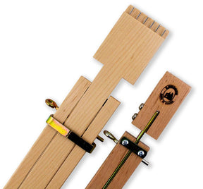 Image of the Leclerc Wooden Temple by Leclerc Looms with multiple components, including notched wooden pieces and metal clasps for adjustment and stability. The wood has a light finish, and the components are connected with screws and brackets. This setup is perfect for working with heavier yarns.