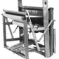 A black and white image of a Leclerc Nilus II 4-Shaft Floor Loom by Leclerc Looms shows its wooden structure, including the frame, heddles, reed, and a partially woven cloth in progress. The loom features pedals at the bottom for operation.