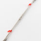 A Wire Repair Heddle, from the brand Leclerc Looms, is a long, thin object made of flat steel featuring a double-pronged fork on each end and red bands near the prongs against a white background.