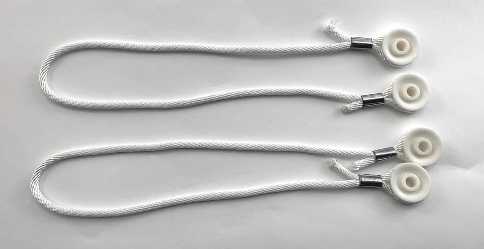 Two Leclerc roller cords for Mira and Fanny Looms, each with a loop on one end and a plastic grommet on the other. The cords are neatly laid out parallel to each other on a smooth, white surface, showcasing their precision and functionality as part of the Mira Counter-Balanced Loom system by Leclerc Looms.