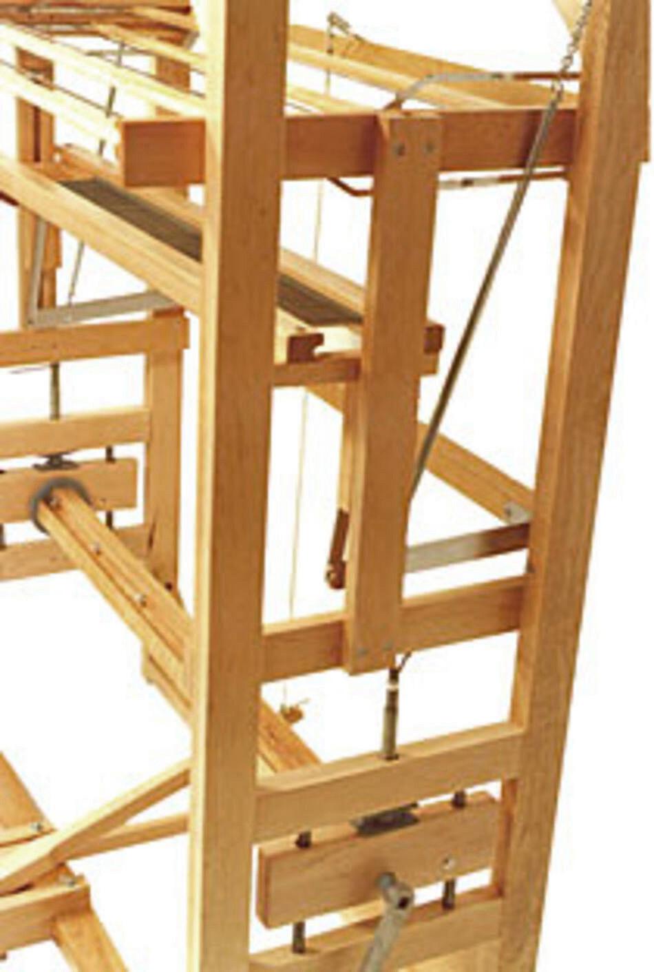 Close-up of a Leclerc Gobelin 2-shaft Add-On Kit. The image showcases the intricate frame and various wooden components, including levers and rods connected by strings or wires. The 2-shaft configuration stands out against the plain white background, highlighting the detailed construction of this Leclerc Looms product.