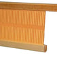 The Leclerc Rigid Heddle Reed, from Leclerc Looms, features closely placed pleats that maximize the surface area for effective air or fluid filtration. This rectangular-shaped filter is constructed with a sturdy wooden frame on both the top and bottom, making it suitable for various types of filtration systems.