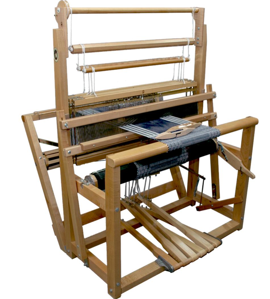 The Leclerc Fanny II 4-shaft Floor Loom by Leclerc Looms is shown. Strings are set up for weaving fabric, and several parts are adjustable for various weaving techniques. The loom structure appears sturdy and is designed for handcrafting textile items.