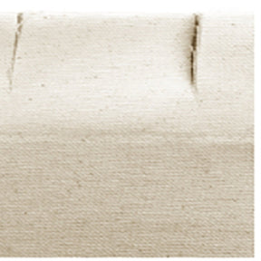 Close-up of the textured edge of a block of tofu, displaying its creamy beige color and smooth surface with subtle creases and lines, reminiscent of a finely woven Leclerc Looms Leclerc Canvas Apron.