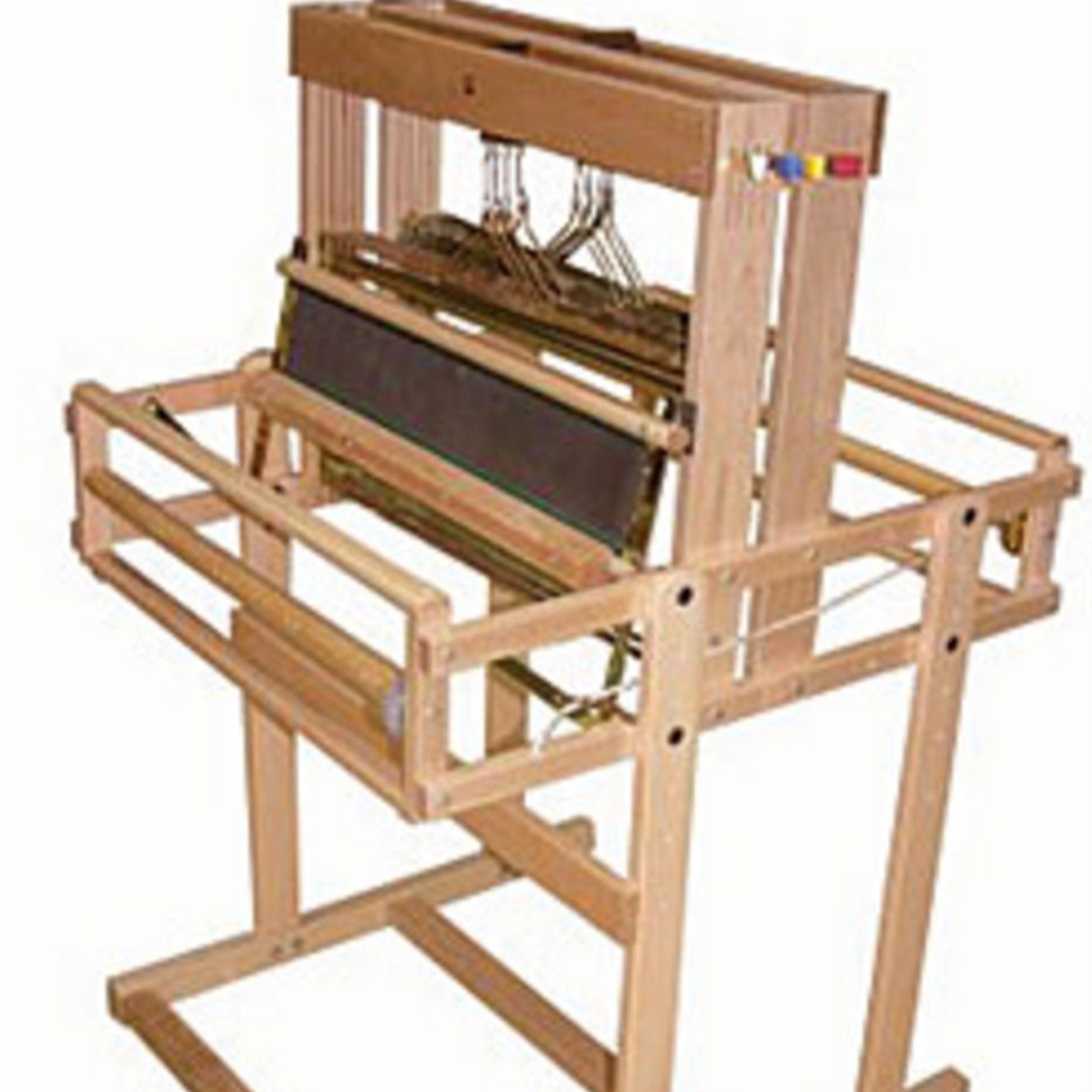 A wooden Jacquard loom, showcasing its intricate frame and metal mechanisms, is mounted on a Leclerc Table Loom Stand for Dorothy or Voyageur 24” by Leclerc Looms. The setup includes vertical wooden supports and a flat horizontal section, with colored threads on one side, emphasizing its detailed structure used for weaving textiles.