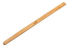 The Kromski Pickup Stick Clear by Kromski North America is a smooth, light brown wooden tool with rounded ends and a small black logo near one end. Despite its potential usefulness among weaving tools, it lacks the usual measuring markings. Featuring a polished finish, it is showcased against a white background.