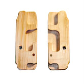 Two wooden blocks with carved-out sections are depicted. These Kromski Harp Rigid Heddle Extra Heddle Support Blocks from Kromski North America have a light brown hue, visible wood grain patterns, and small dark spots. The left block has a smoother finish compared to the right one. Shown against a white background, these support blocks resemble components for a Kromski Harp loom.