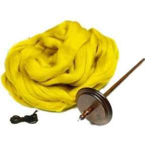 The Kromski Drop Spindle Kit from Kromski North America, featuring a vibrant yellow bundle of Polish Merino wool roving, is paired perfectly with a wooden drop spindle for handspinning. A small skein of dark yarn complements the set, all beautifully arranged against a white background.