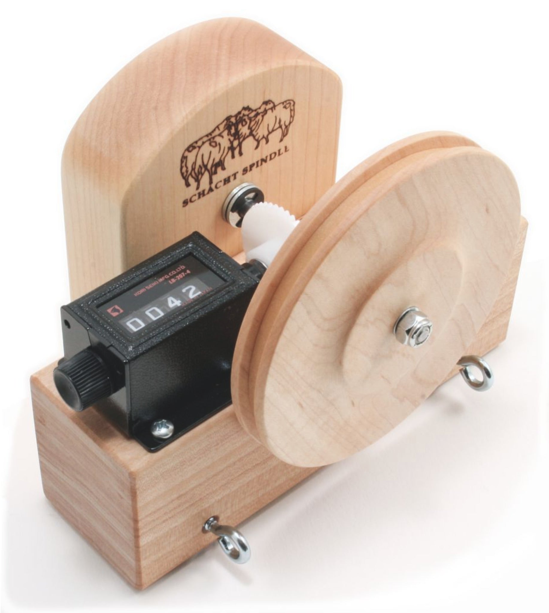 The Schacht Yardage Counter by Schacht Spindle Co. is a digital yarn counter crafted from light-colored wood, featuring two large wooden discs and a small digital display that shows a counting number of 042. It is ideal for measuring yarn length, particularly when dealing with heavier yarns. This innovative device ensures precision in every project.