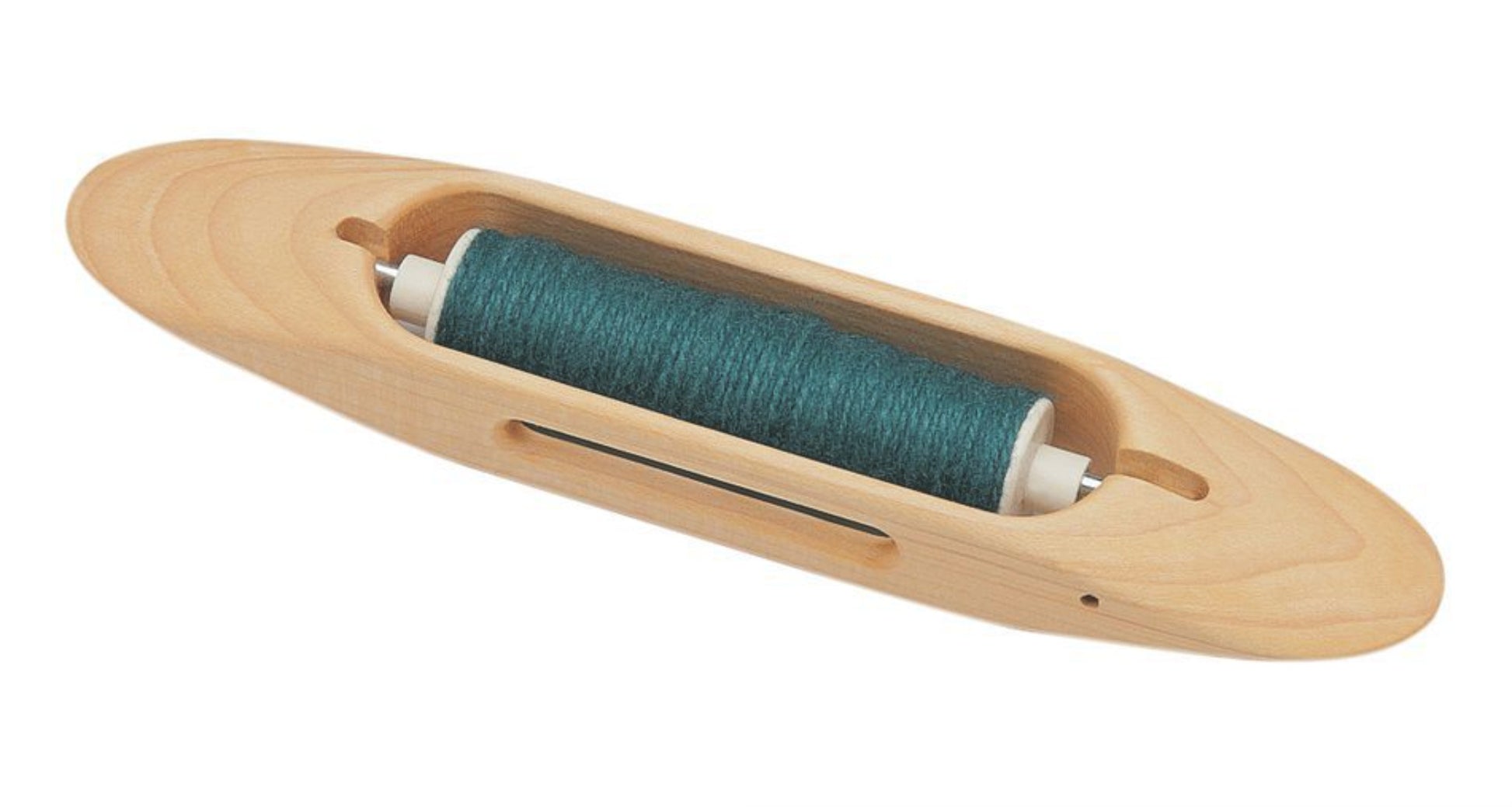 The Schacht Boat Shuttle by Schacht Spindle Co. features a smooth, elongated oval shape with a hollowed-out middle section that holds a spool of teal thread in the center.