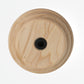 A round Schacht Whorl by Schacht Spindle Co., featuring a visible wood grain pattern and a central black screw hole, viewed from above.