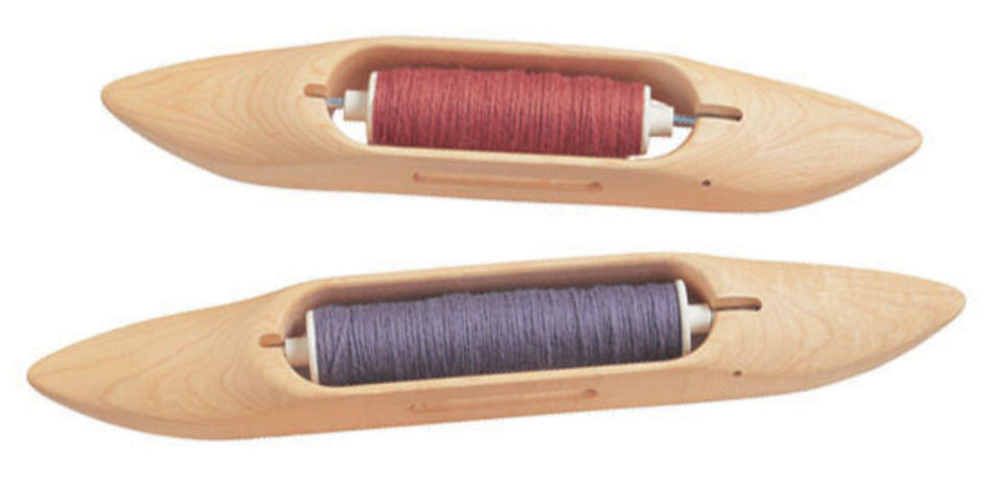 Two Schacht Boat Shuttles from Schacht Spindle Co. used for weaving, each containing a bobbin of thread. The top shuttle holds red thread, while the bottom shuttle holds dark purple thread. The smooth, elongated designs of the shuttles are visible, emphasizing their craftsmanship.